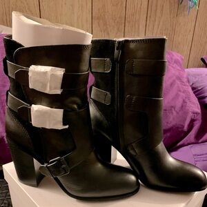 Calvin Klein black boots. NWT